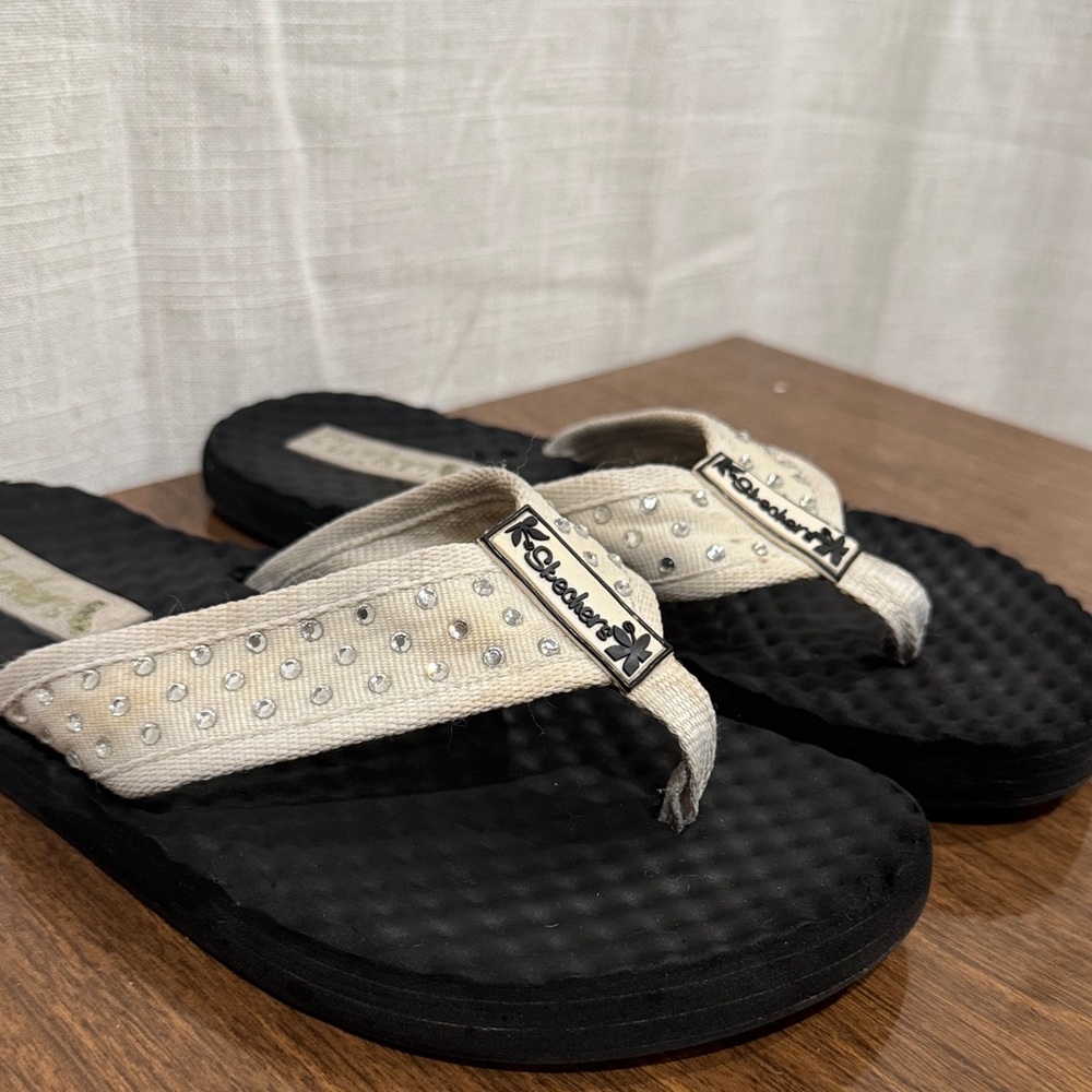 Beige and Black Flip Flops